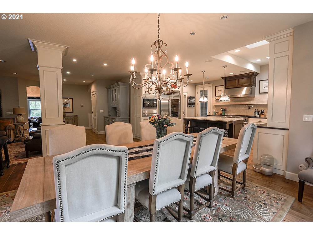 531 South 19th Place Ridgefield, WA 98642 - Photo 10 of 32 a dining room with furniture and chandelier
