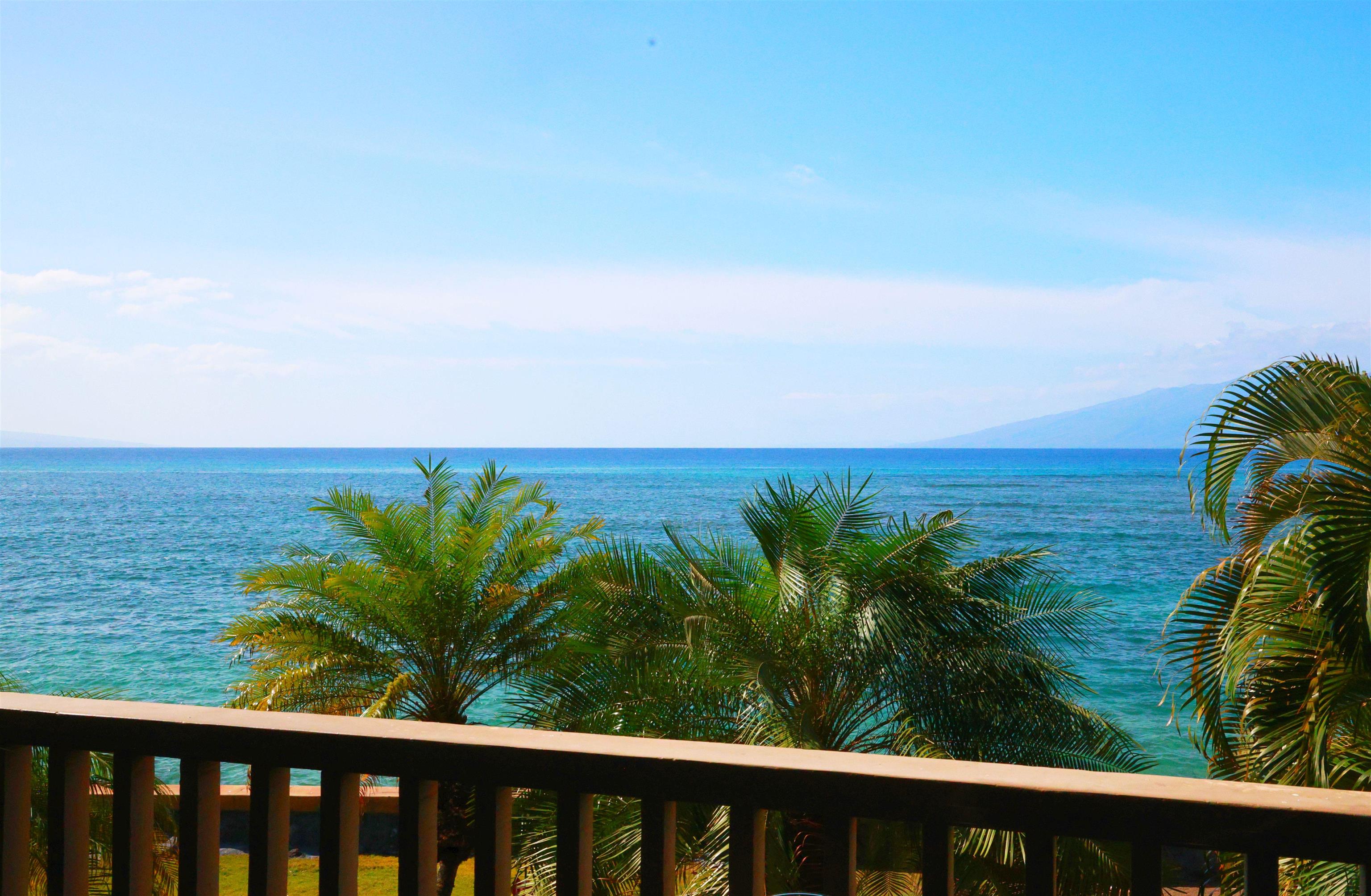 4435 Lower Honoapiilani Road, Unit 205 Lahaina, HI 96761 - Photo 1 of 26 a view of a beach with an ocean view