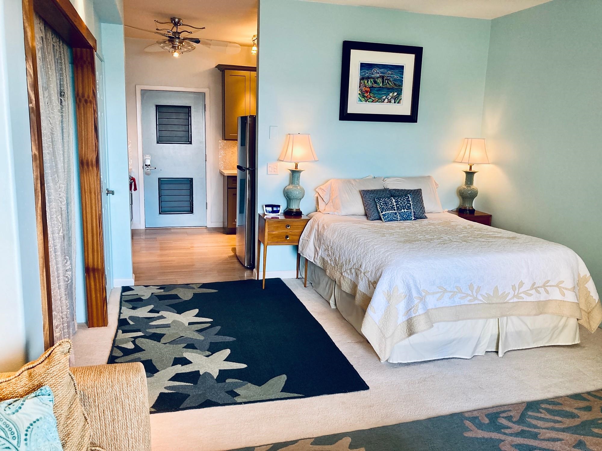 4435 Lower Honoapiilani Road, Unit 205 Lahaina, HI 96761 - Photo 2 of 26 a bed room with a bed and a couch