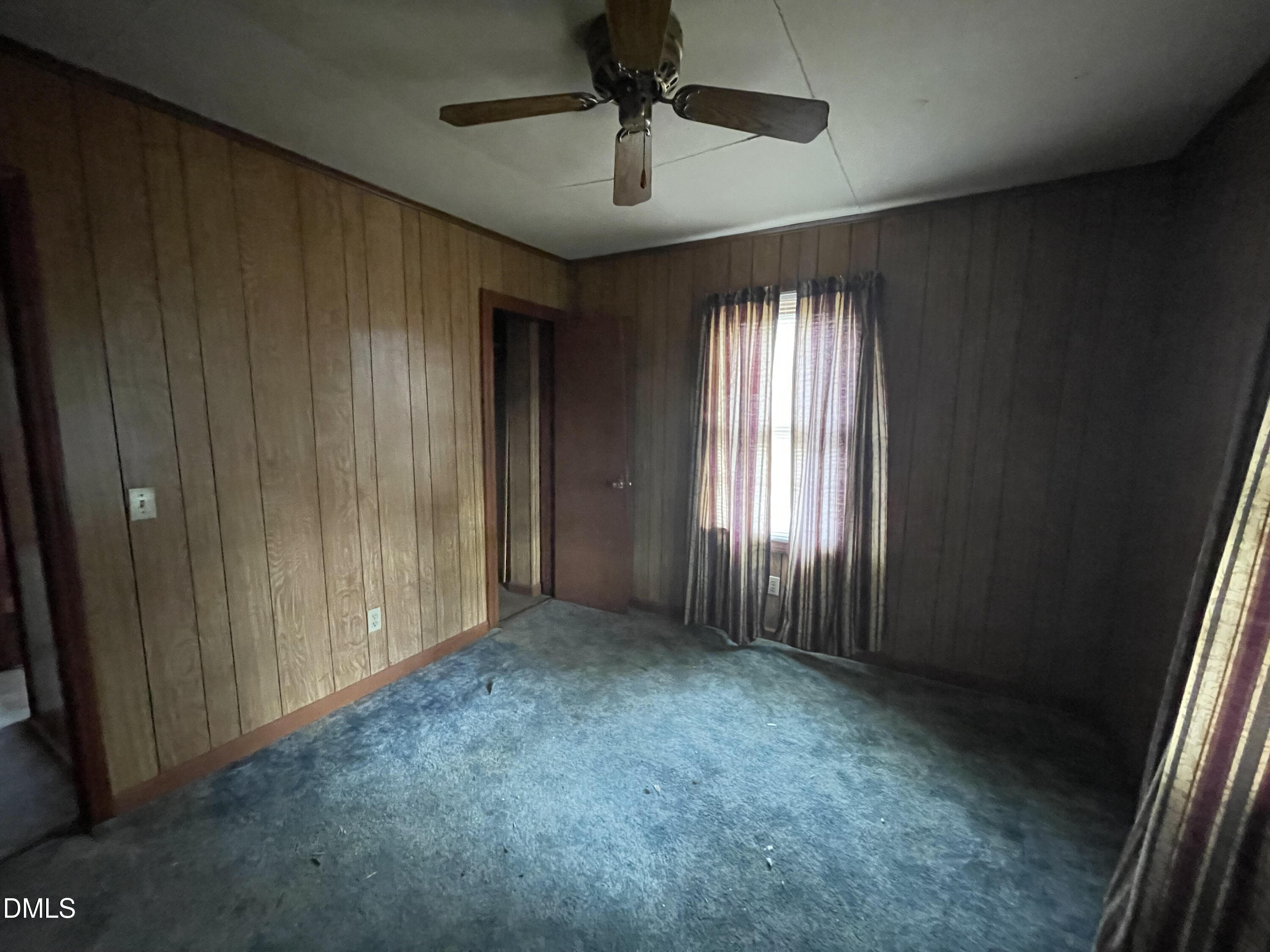 1023 Leasburg Road Roxboro, NC 27573 - Photo 10 of 12 a view of an empty room with a window