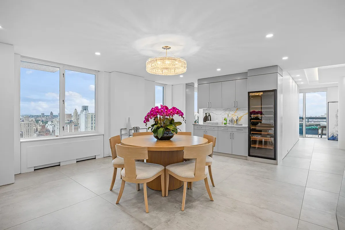 422 East 72nd Street, Unit 37AD Manhattan, NY 10021 - Photo 11 of 58 a view of a dining room with furniture and window