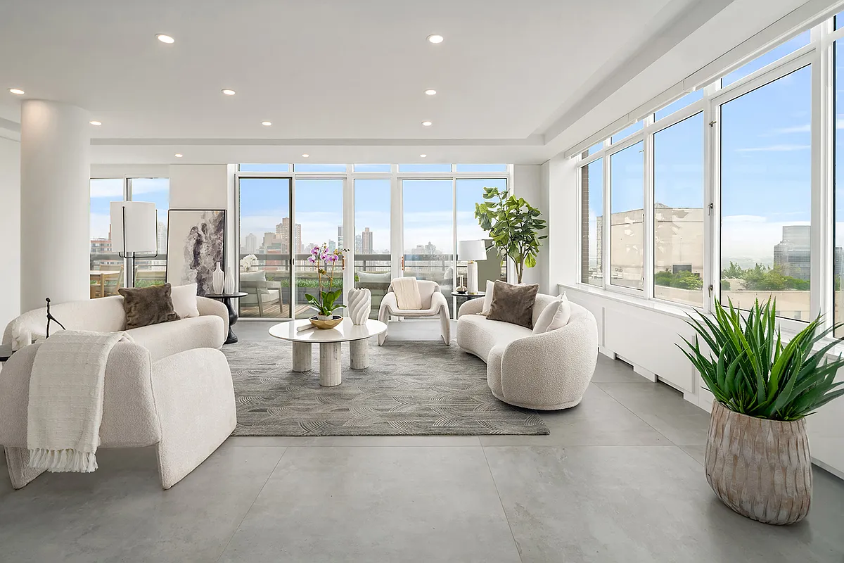 422 East 72nd Street, Unit 37AD Manhattan, NY 10021 - Photo 2 of 58 a living room with furniture and large windows