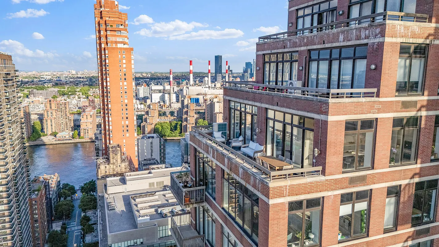 422 East 72nd Street, Unit 37AD Manhattan, NY 10021 - Photo 54 of 58 a view of a city from a balcony
