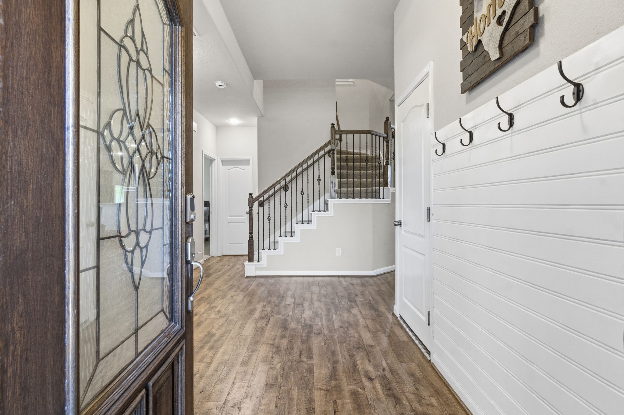 3900 Enchanted Timbers Lane Spring, TX 77386 - Photo 9 of 49 a view of entryway with wooden floor