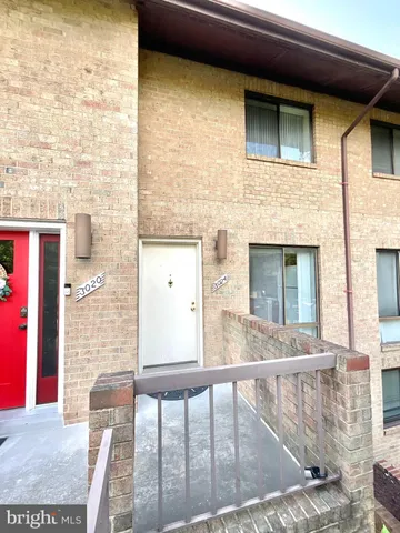 a view of balcony with furniture