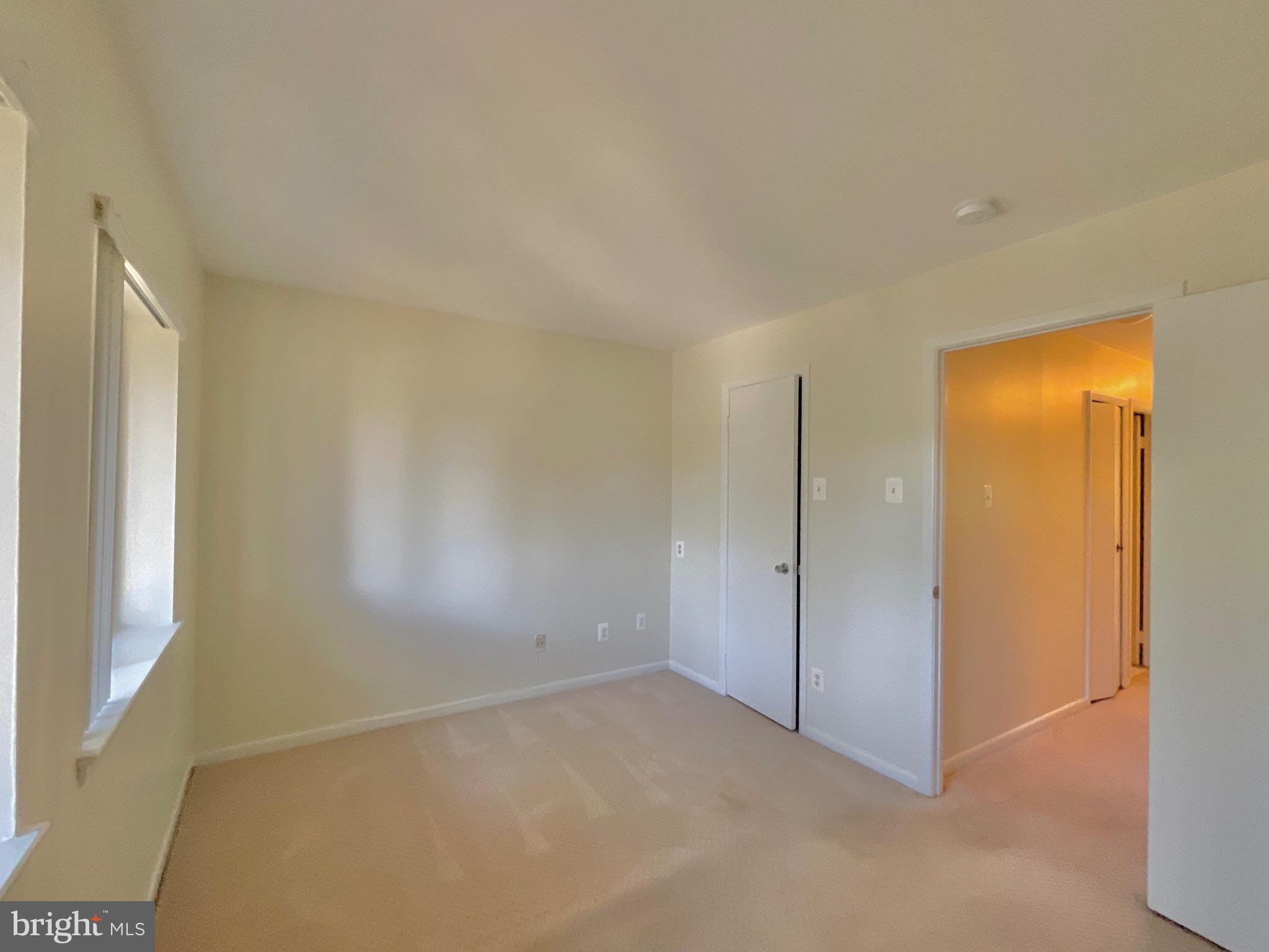 3024 Gentain Court Northeast, Unit 3024 Washington, DC 20017 - Photo 13 of 26 a view of an empty room