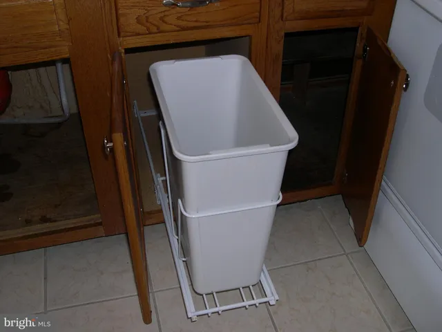 a view of empty room with floor to ceiling window