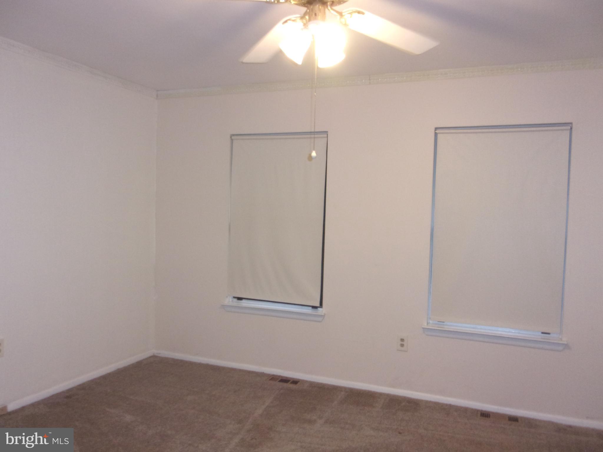 48 Chelsea Circle Clementon, NJ 08021 - Photo 13 of 15 an empty room with a window