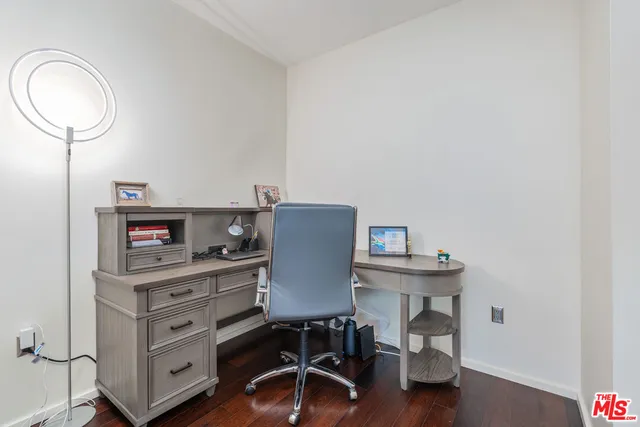a view of a workspace with furniture