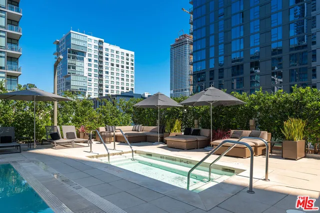 a view of pool with outdoor seating