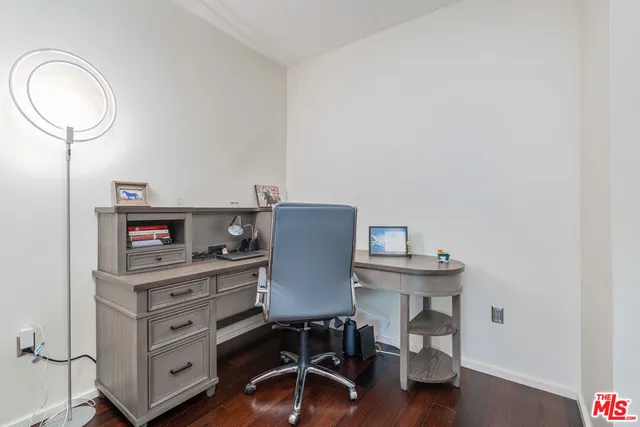 a view of a workspace with furniture