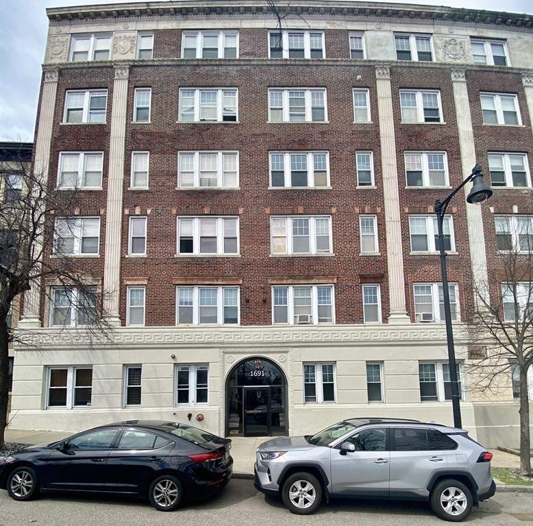 1691 Commonwealth Avenue, Unit 31 Boston, MA 02135 - Photo 10 of 12 a car parked in front of a building