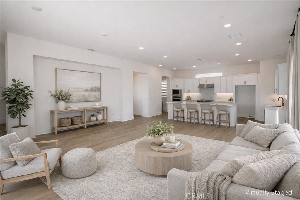 2173 Swaim Way Tustin, CA 92782 - Photo 13 of 34 a living room with furniture and kitchen view