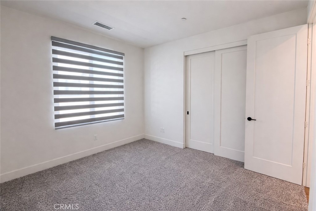 2173 Swaim Way Tustin, CA 92782 - Photo 15 of 34 a view of an empty room with a window
