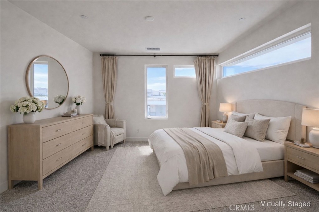 2173 Swaim Way Tustin, CA 92782 - Photo 20 of 34 a bedroom with a bed and a dresser