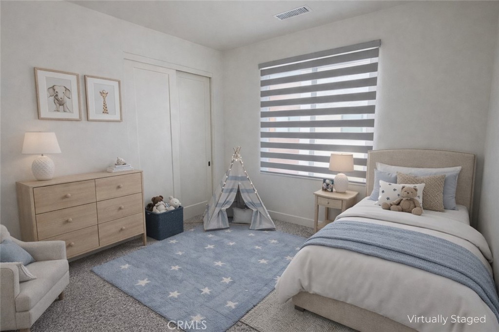 2173 Swaim Way Tustin, CA 92782 - Photo 26 of 34 a bedroom with a bed and a window