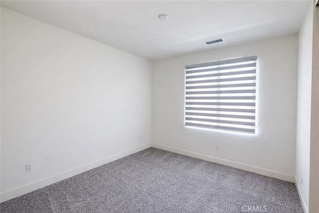 2173 Swaim Way Tustin, CA 92782 - Photo 28 of 34 an empty room with a window