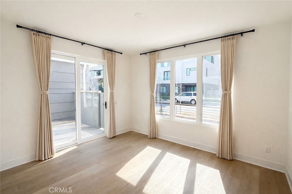 2173 Swaim Way Tustin, CA 92782 - Photo 5 of 34 an empty room with windows