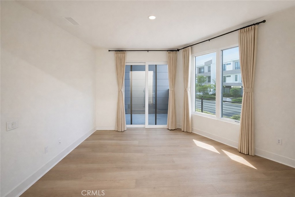2173 Swaim Way Tustin, CA 92782 - Photo 6 of 34 a view of an empty room with a window