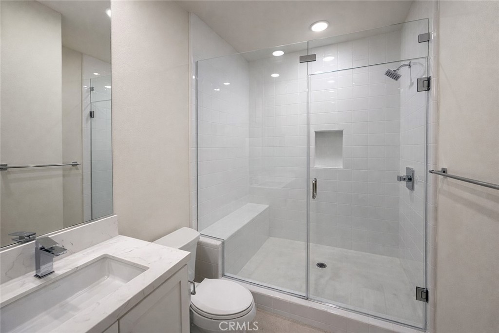 2173 Swaim Way Tustin, CA 92782 - Photo 7 of 34 a bathroom with a sink toilet and shower