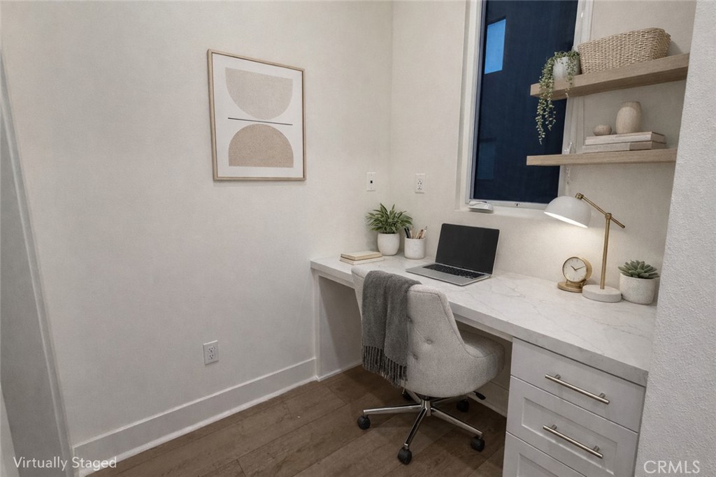 2173 Swaim Way Tustin, CA 92782 - Photo 9 of 34 a workspace with furniture and wooden floor