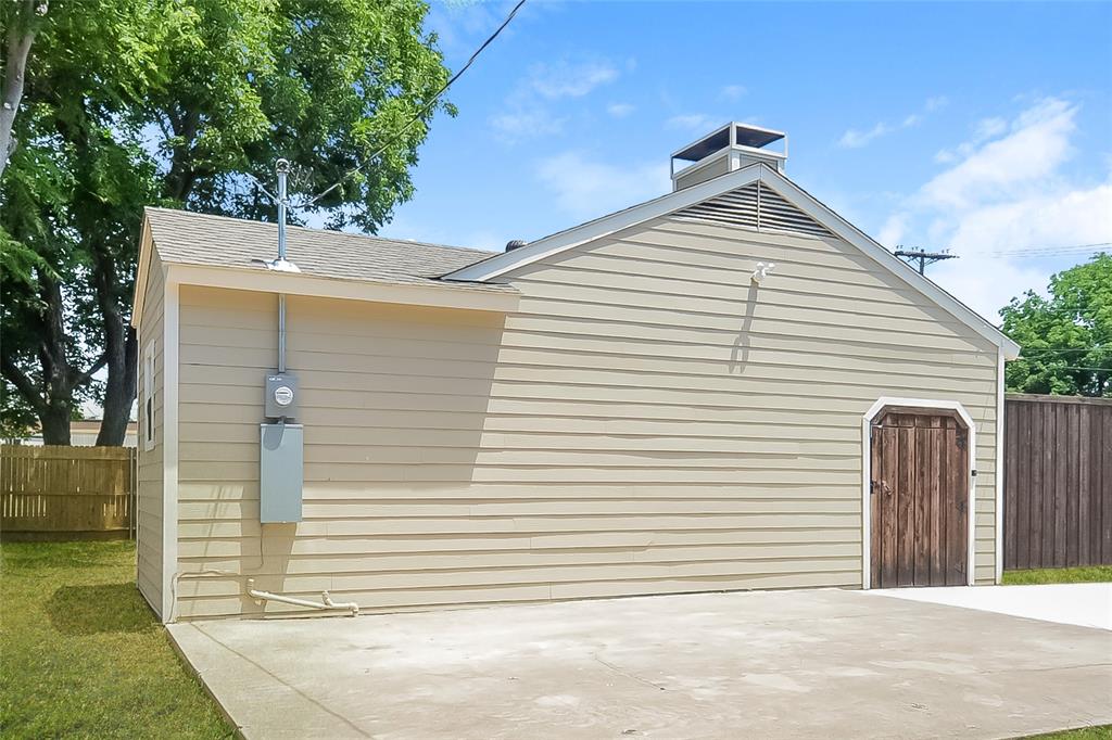 808 22nd Street Plano, TX 75074 - Photo 14 of 16 a view of a house with a garage
