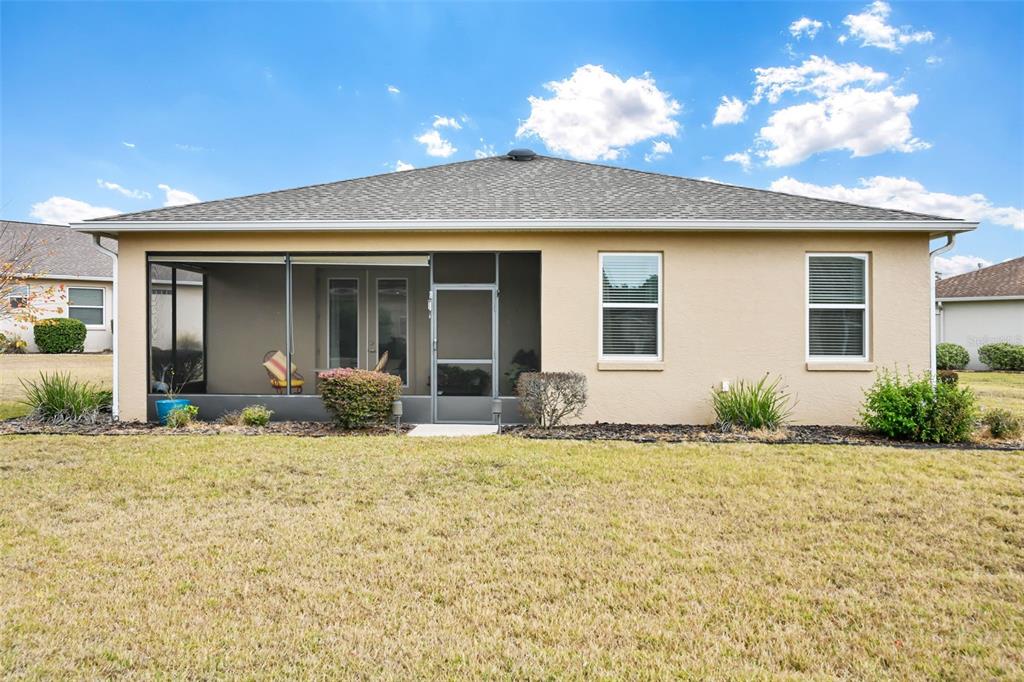 8237 Southwest 78th Terrace Road Ocala, FL 34476 - Photo 21 of 22 a view of a house with patio