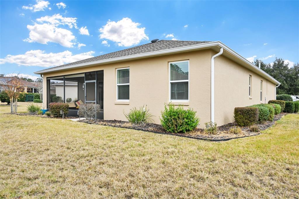 8237 Southwest 78th Terrace Road Ocala, FL 34476 - Photo 22 of 22 a view of a house with backyard and sitting area