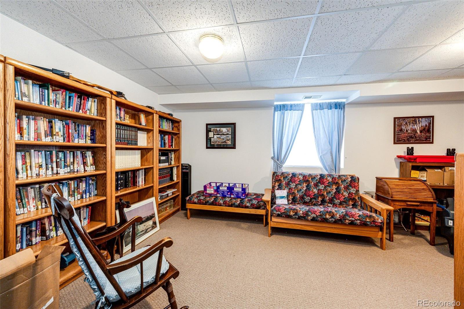 4420 Behrens Road Byers, CO 80103 - Photo 15 of 39 a room with toys and pool table