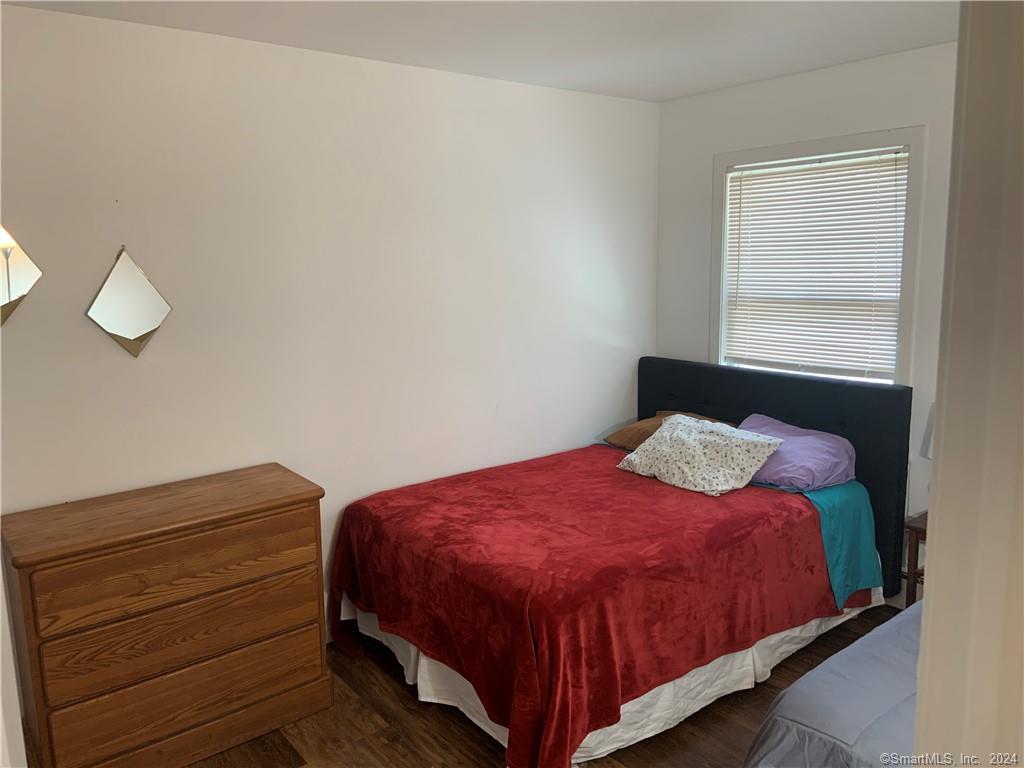 9 Beech Street Farmington, CT 06032 - Photo 15 of 37 a bedroom with a bed and window