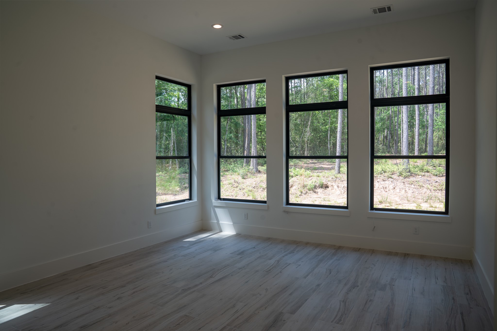 343 Sundog Road Huntsville, TX 77340 - Photo 19 of 37 Another view of the primary bedroom.