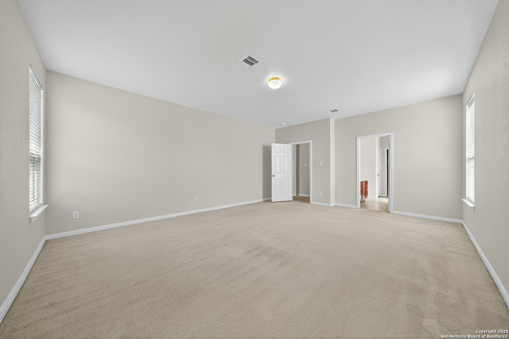 221 Springtree Cove Cibolo, TX 78108 - Photo 19 of 33 a view of an empty room with a window