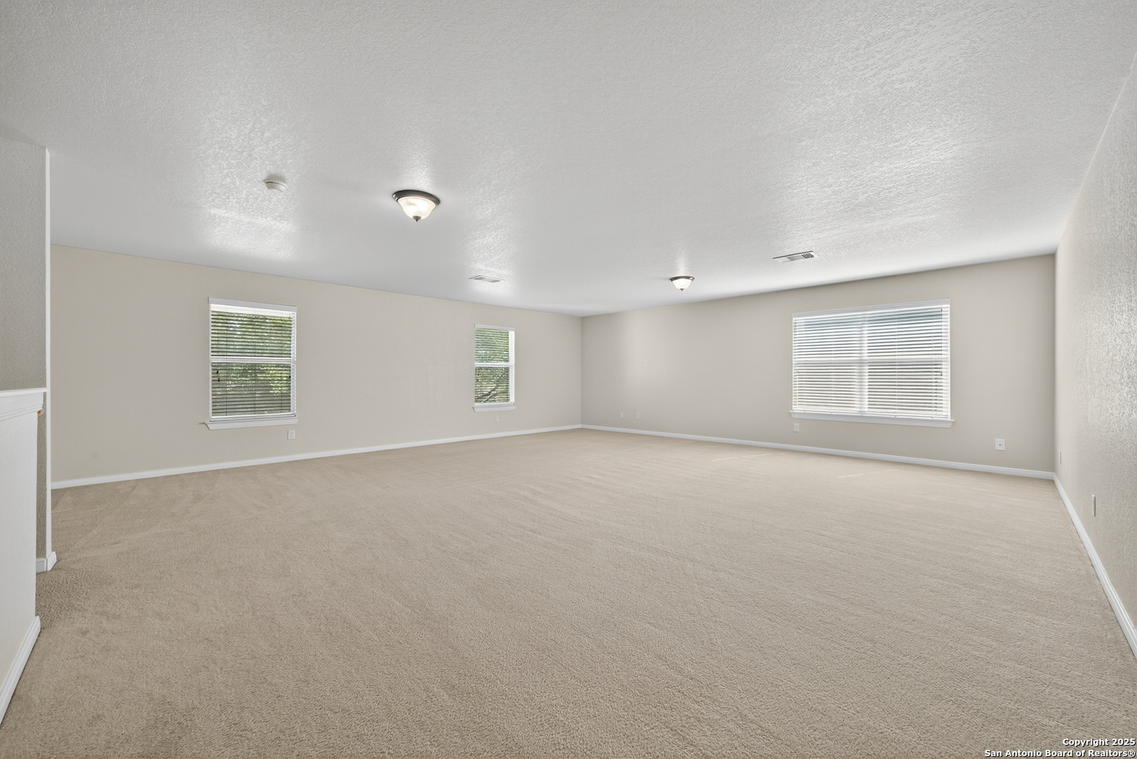 221 Springtree Cove Cibolo, TX 78108 - Photo 27 of 33 a view of an empty room with a window