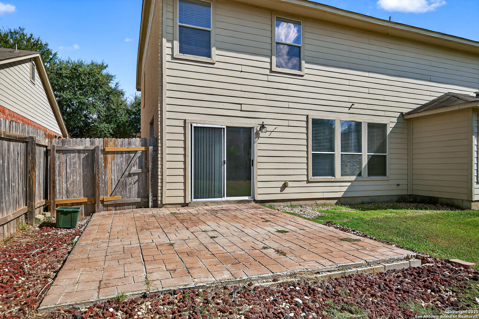 221 Springtree Cove Cibolo, TX 78108 - Photo 30 of 33 a front view of a house with a garden