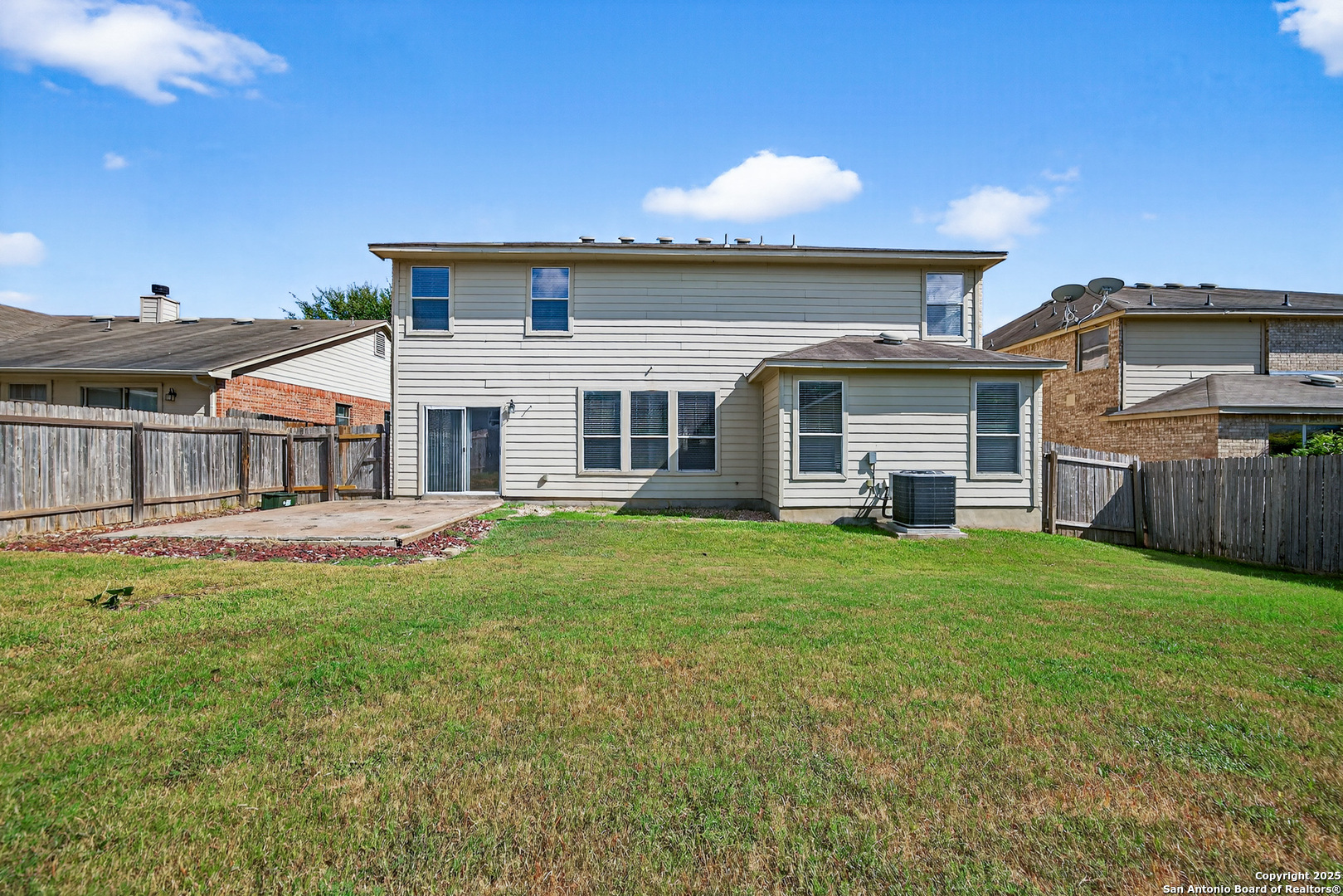 221 Springtree Cove Cibolo, TX 78108 - Photo 32 of 33 a view of a house with a backyard and balcony