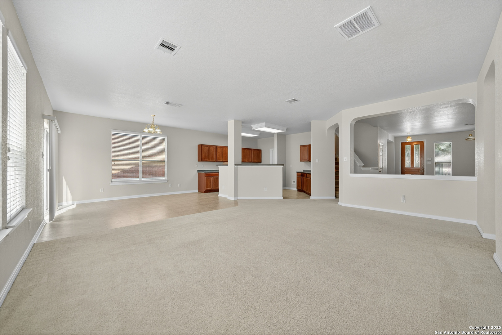 221 Springtree Cove Cibolo, TX 78108 - Photo 8 of 33 a view of an empty room with a window