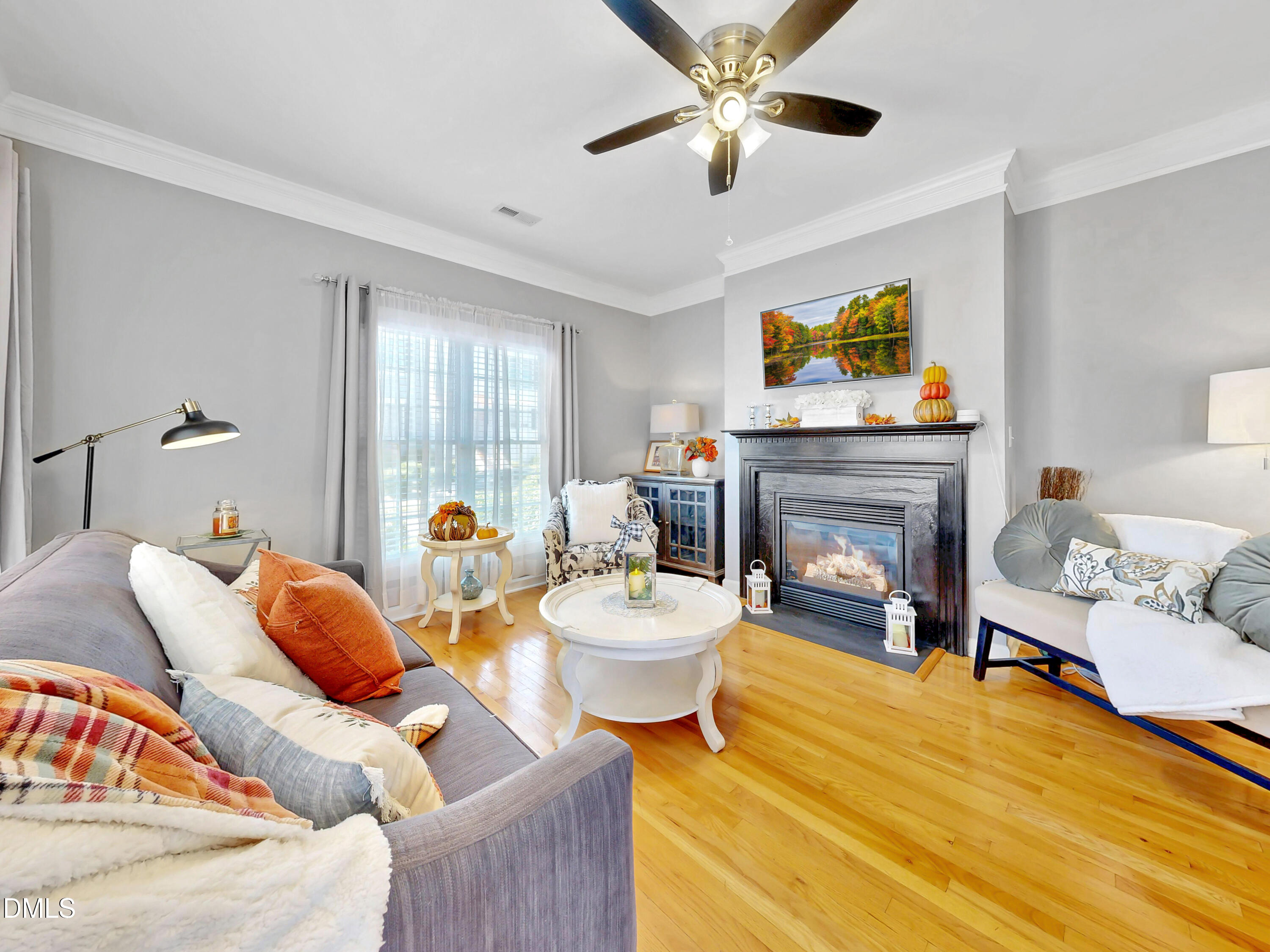 200 Madison Grove Place Cary, NC 27519 - Photo 10 of 49 a living room with furniture and a fireplace
