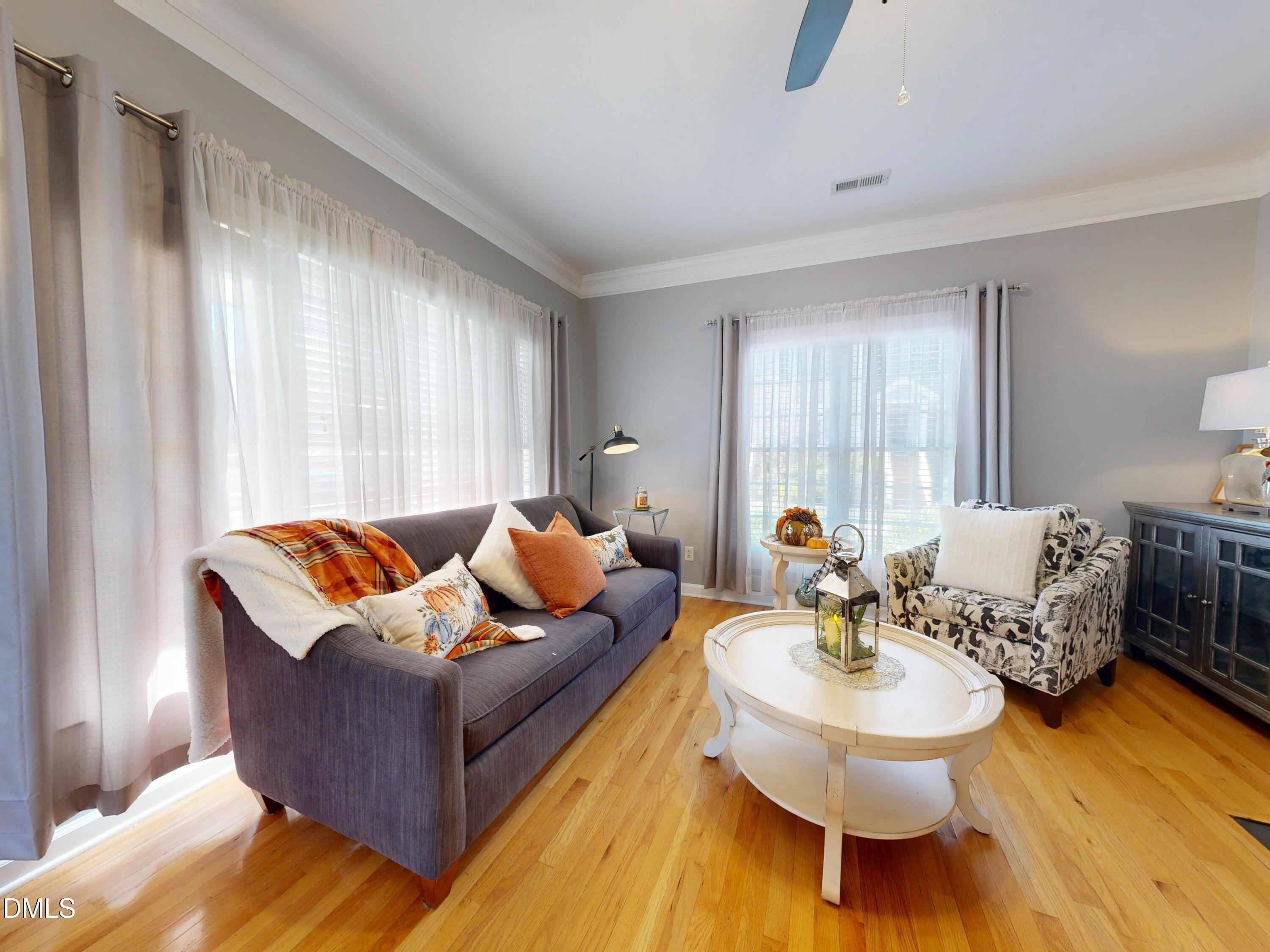 200 Madison Grove Place Cary, NC 27519 - Photo 11 of 49 a living room with furniture and a table