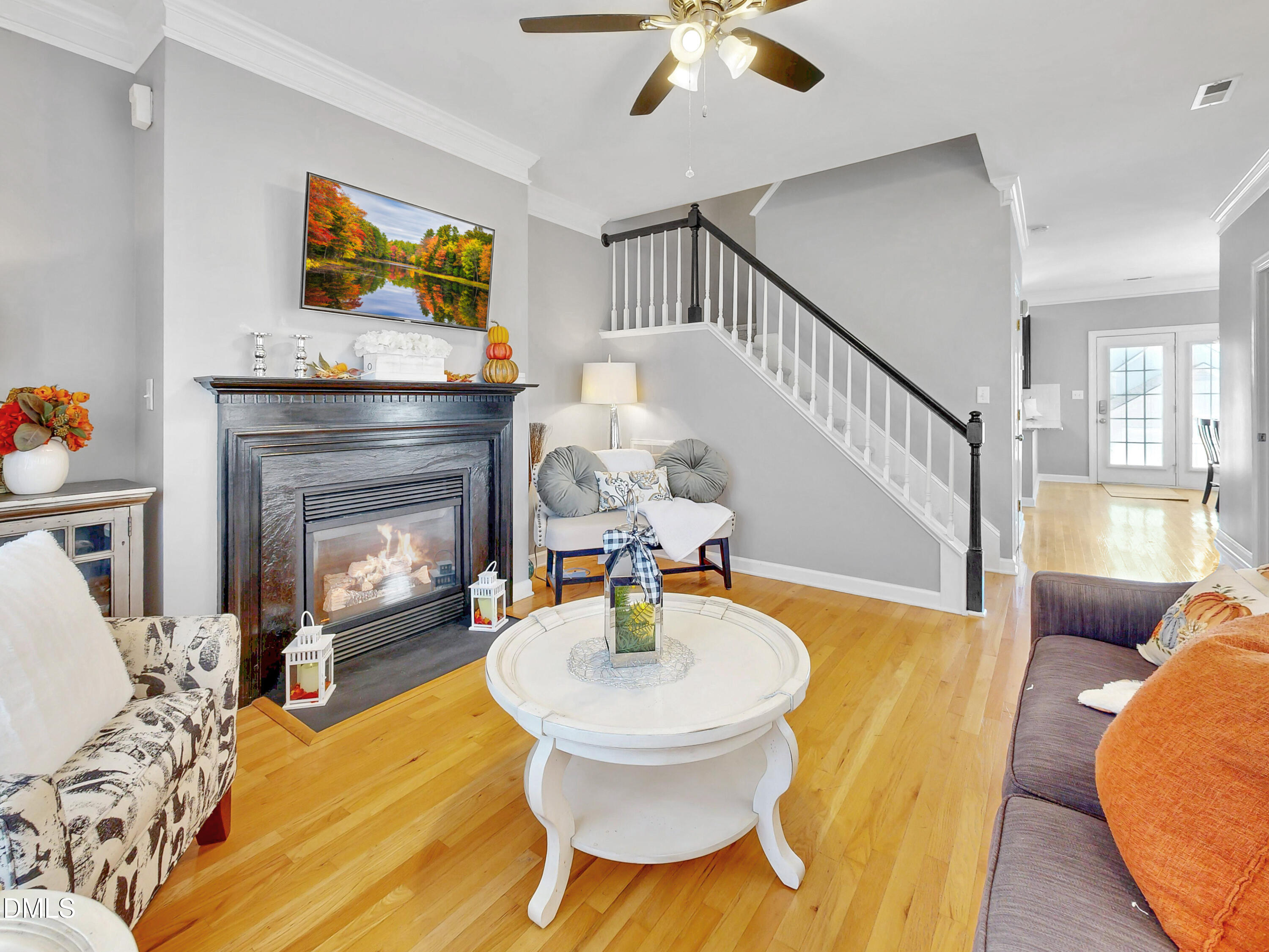 200 Madison Grove Place Cary, NC 27519 - Photo 12 of 49 a living room with furniture and a fireplace