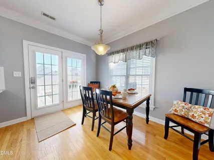 a view of kitchen with stainless steel appliances granite countertop a stove top oven a sink and dishwasher