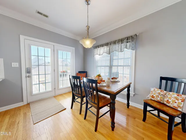 a view of kitchen with stainless steel appliances granite countertop a stove top oven a sink and dishwasher