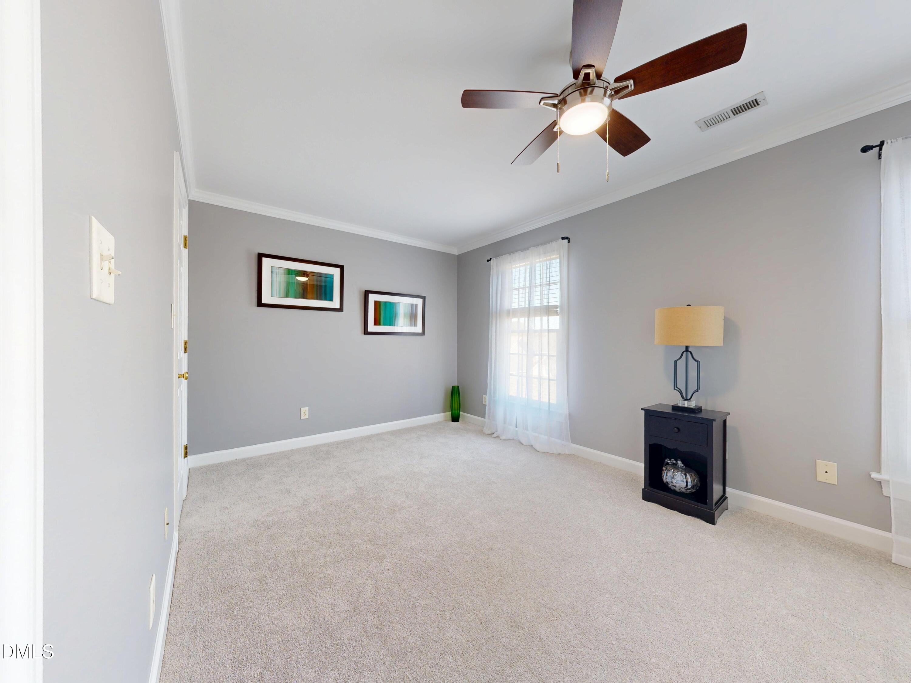 200 Madison Grove Place Cary, NC 27519 - Photo 25 of 49 a living room with furniture and a window