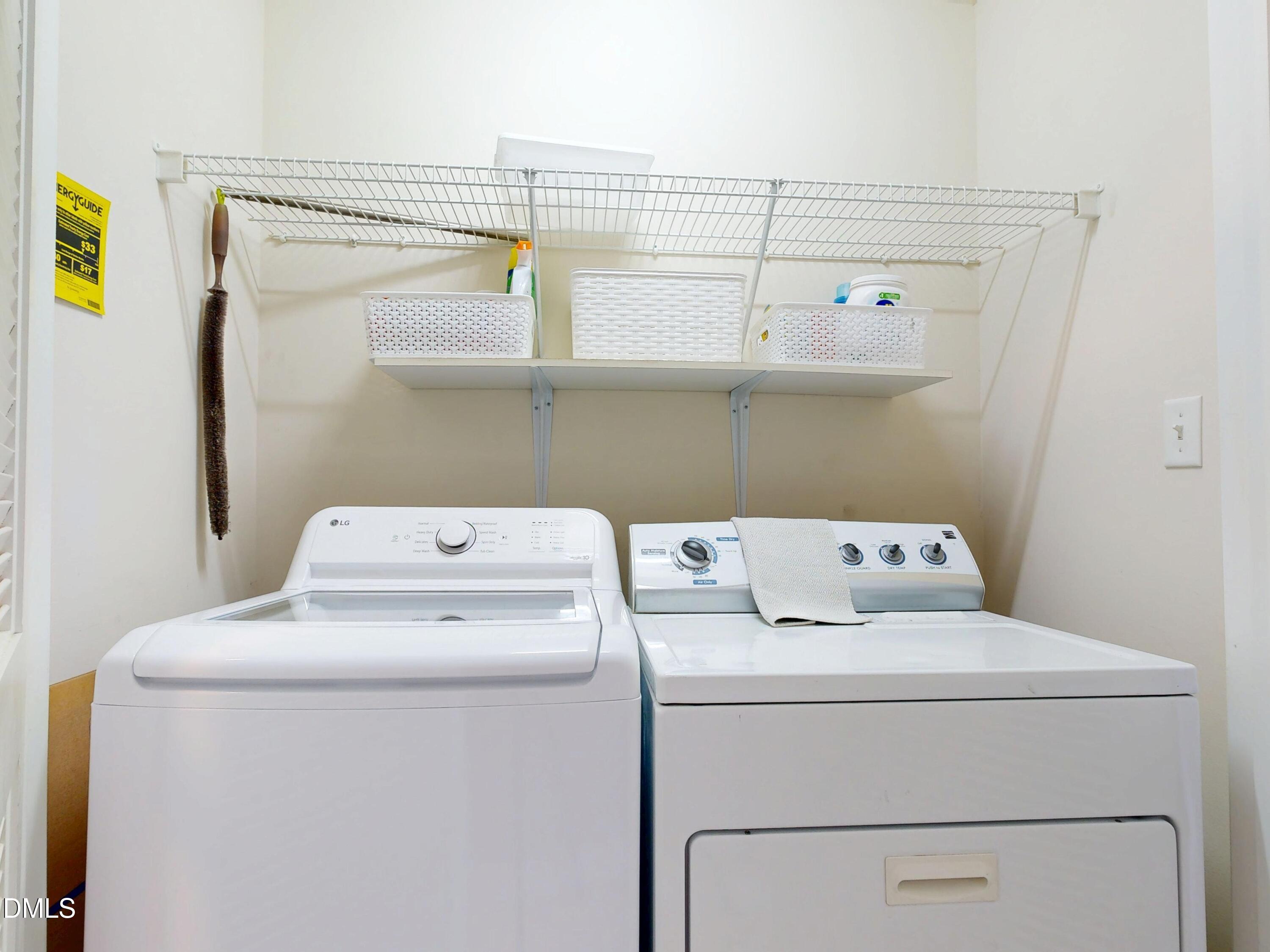200 Madison Grove Place Cary, NC 27519 - Photo 26 of 49 a utility room with dryer and washer