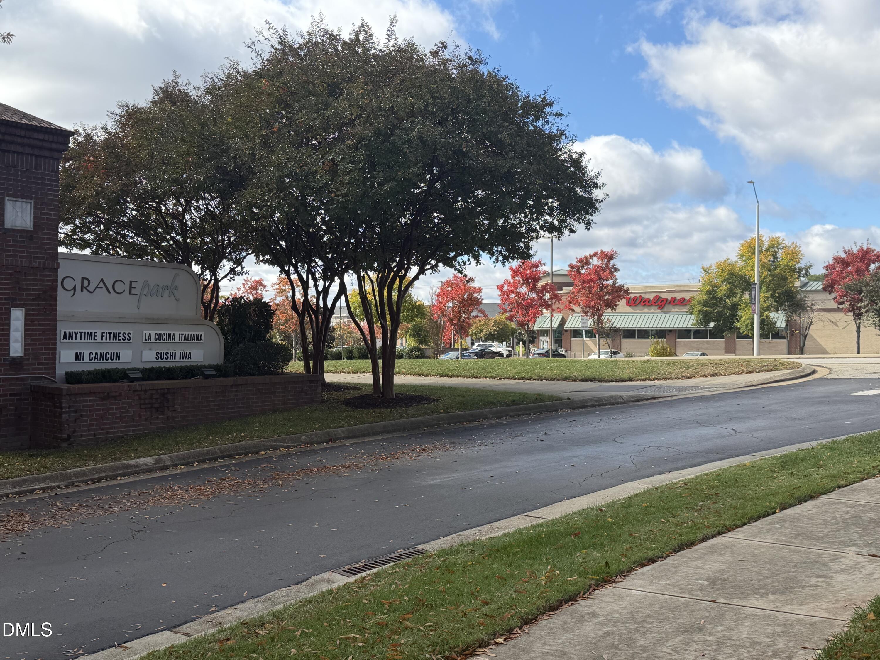 200 Madison Grove Place Cary, NC 27519 - Photo 44 of 49 a front view of a house with a yard