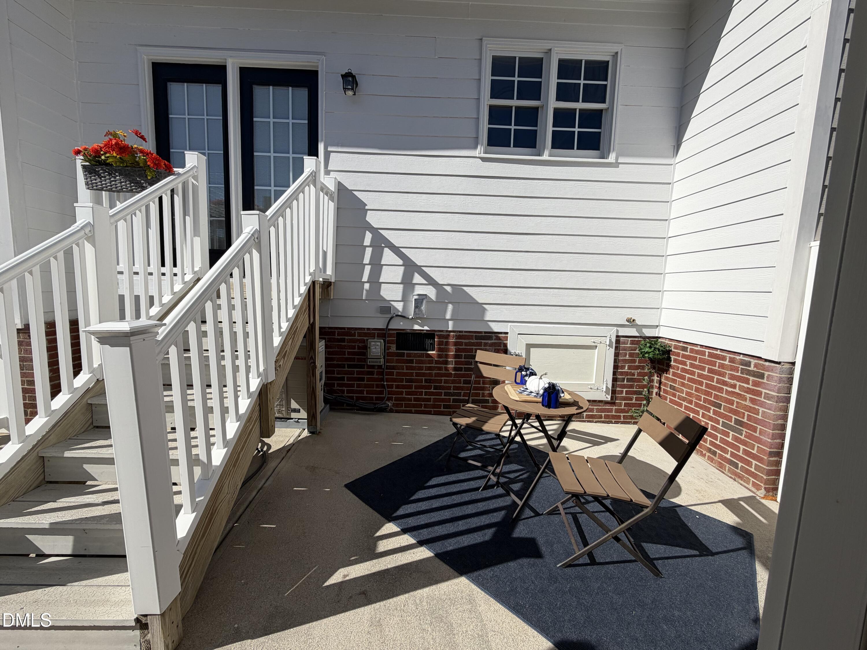 200 Madison Grove Place Cary, NC 27519 - Photo 7 of 49 a view of a porch with furniture and a window