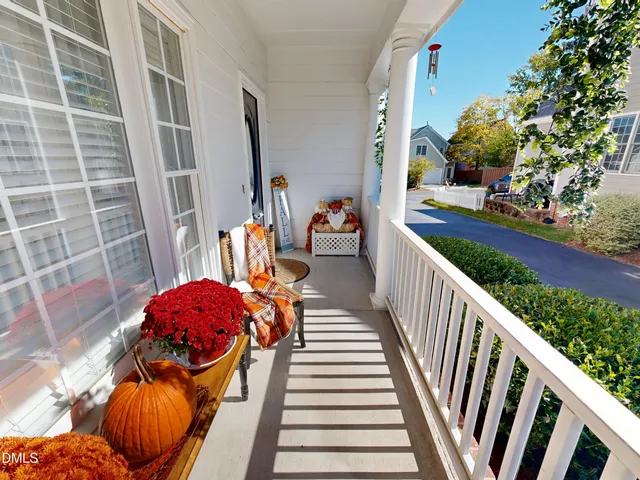a view of a patio with couches chairs and potted plants
