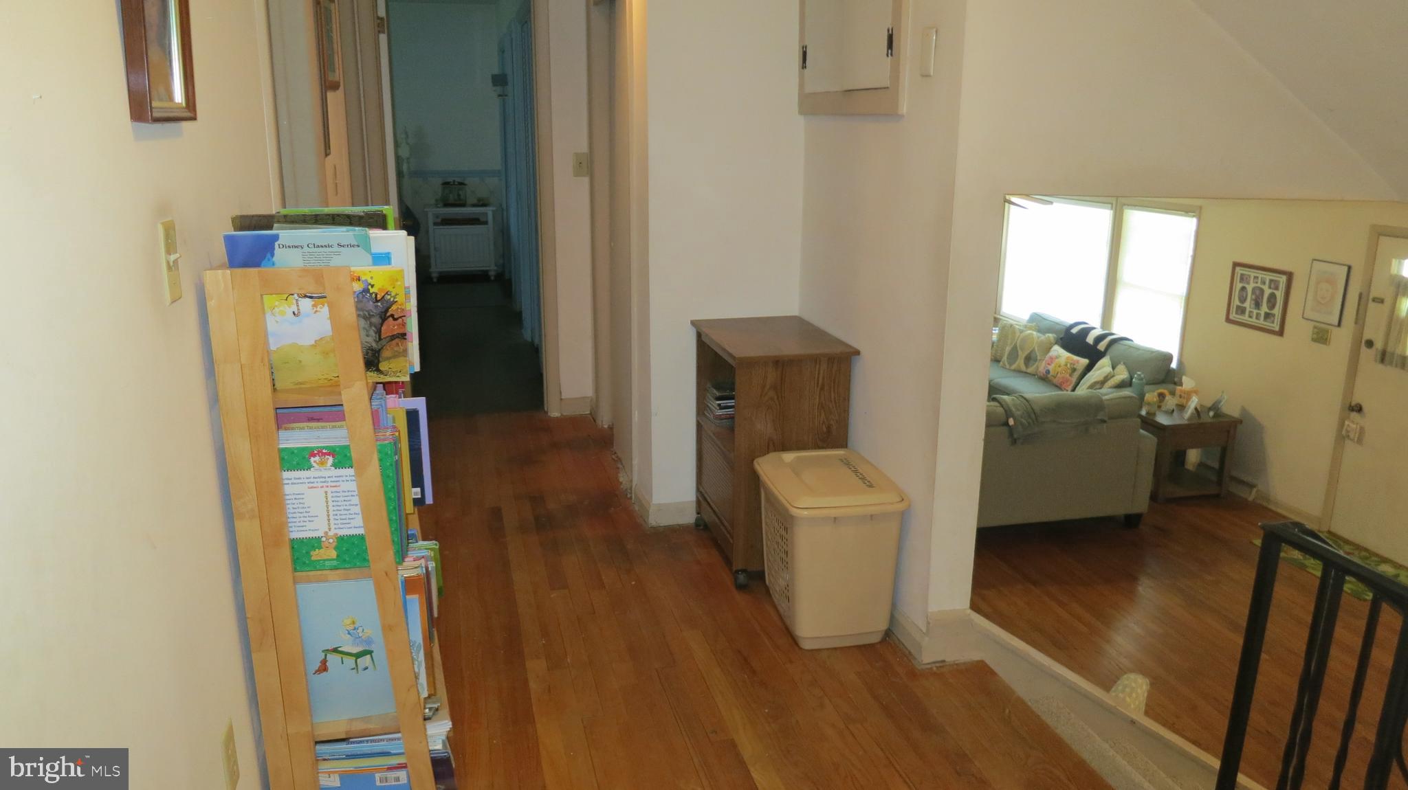 79 Ewingville Road Ewing, NJ 08638 - Photo 27 of 67 a living room with furniture and a gate