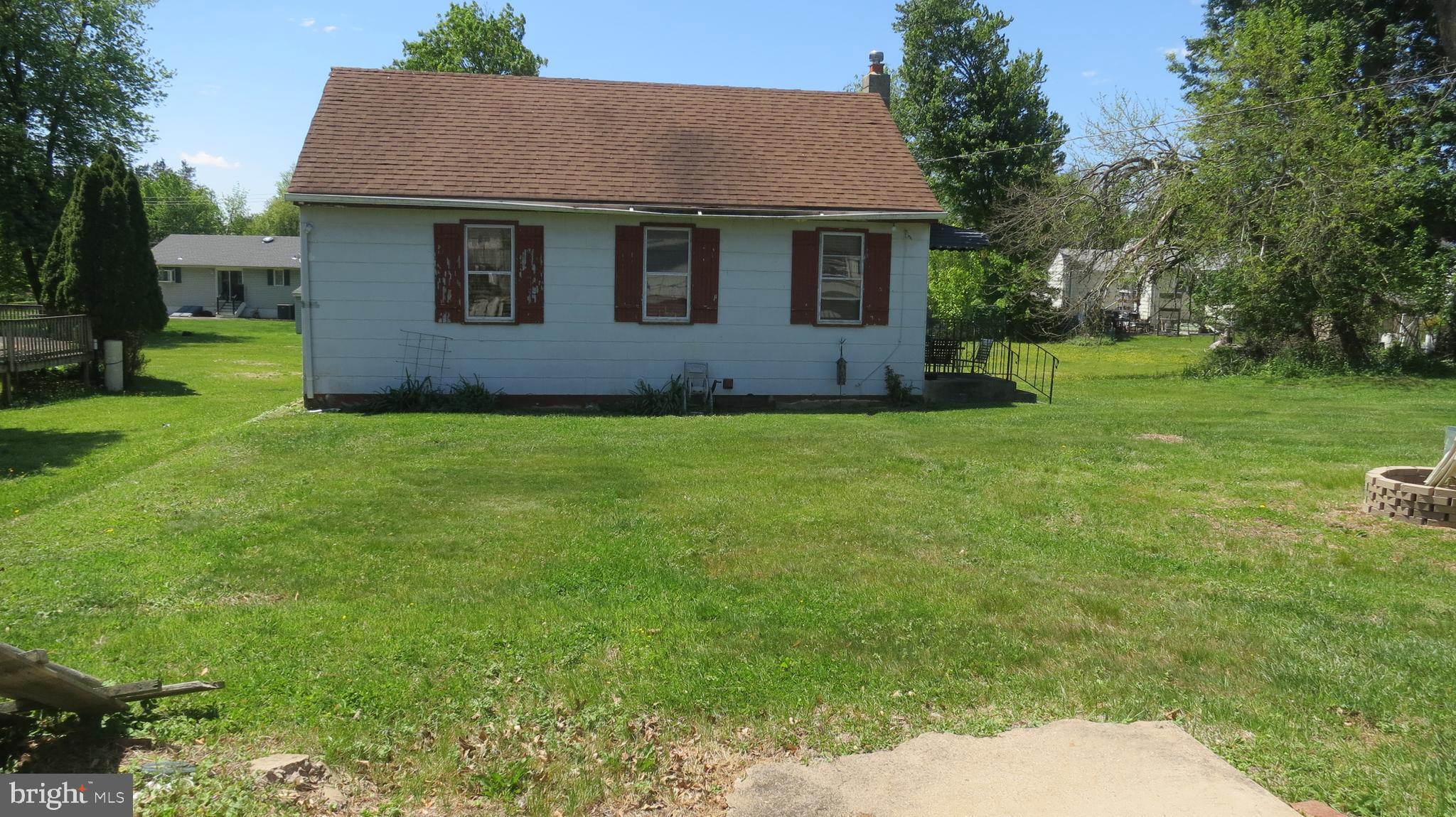 79 Ewingville Road Ewing, NJ 08638 - Photo 47 of 67 a front view of house with yard and trees