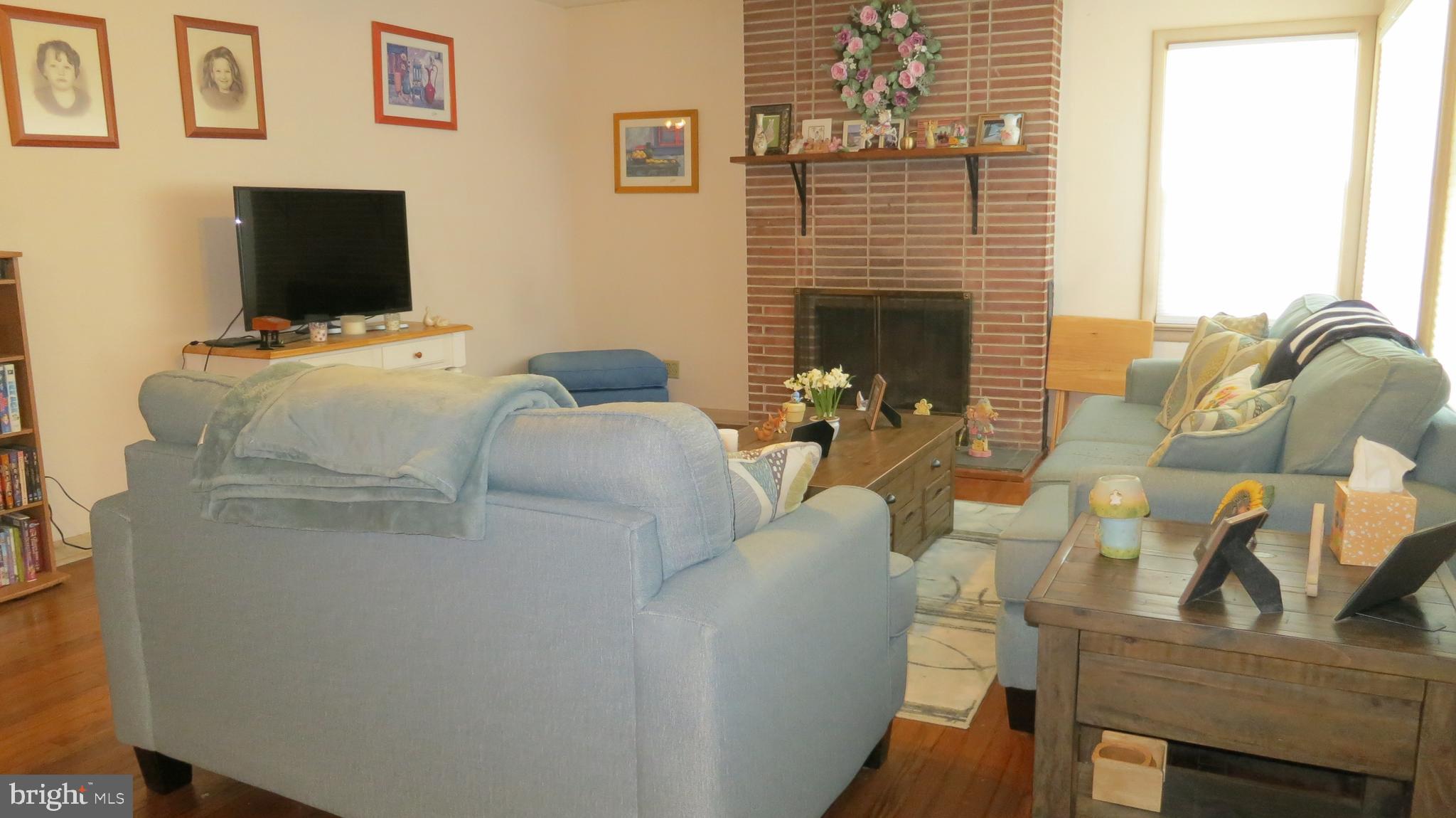 79 Ewingville Road Ewing, NJ 08638 - Photo 5 of 67 a living room with furniture and a flat screen tv