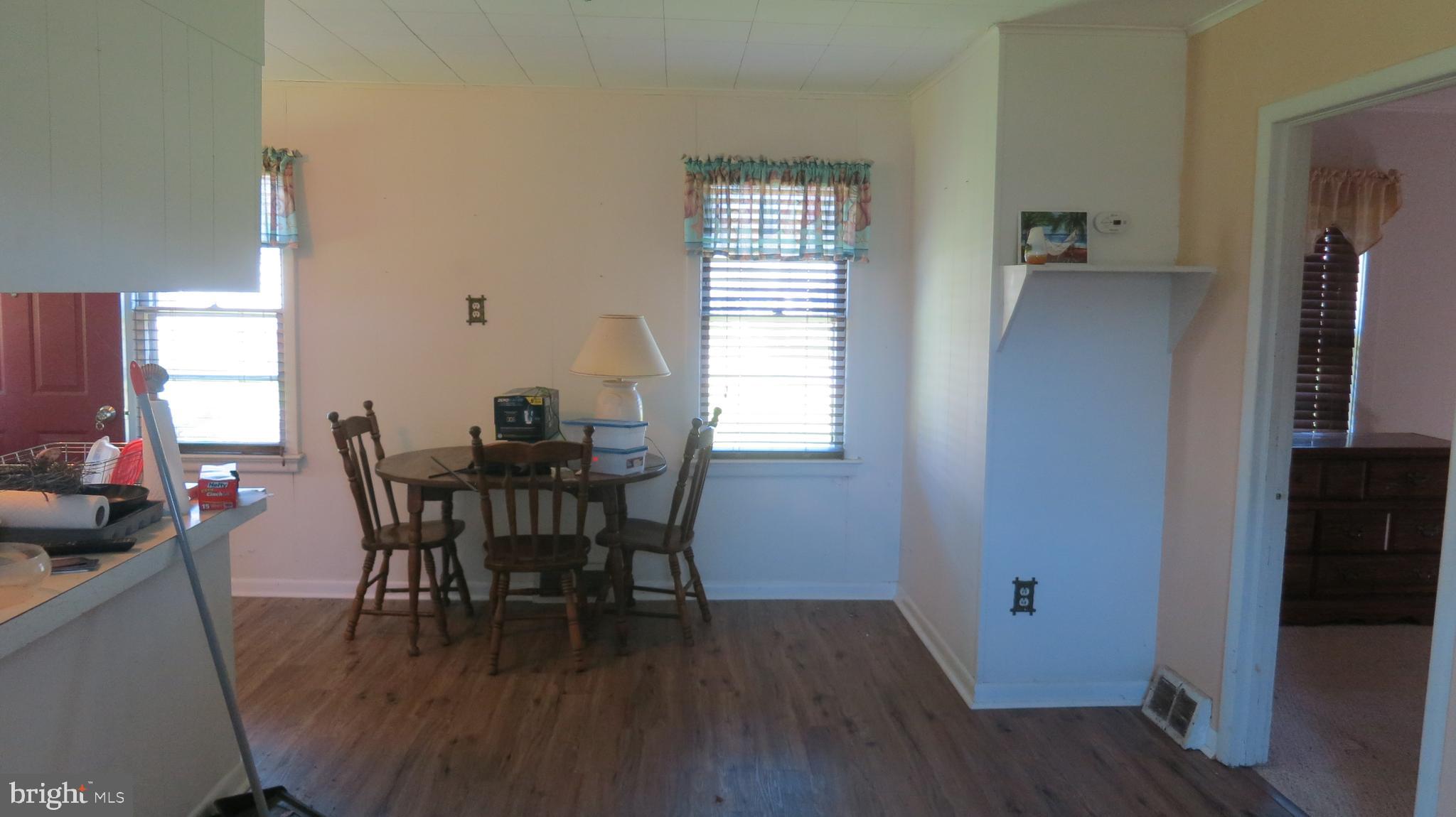 79 Ewingville Road Ewing, NJ 08638 - Photo 54 of 67 a view of a dining room with furniture and wooden floor